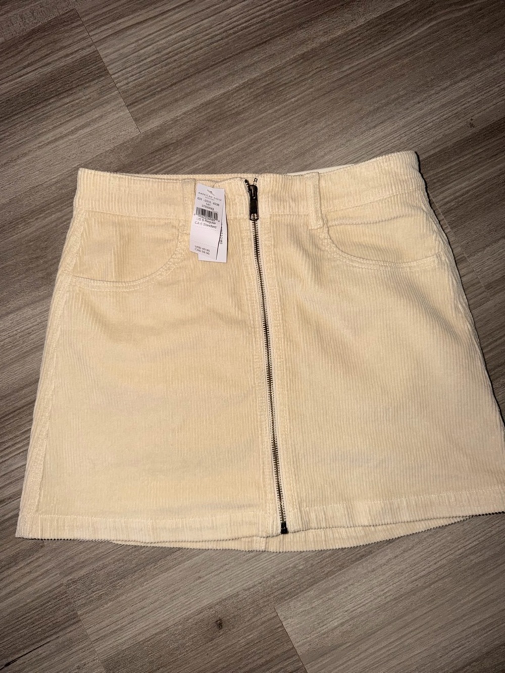American Eagle Corduroy Zip-Front Mini Skirt in Cream